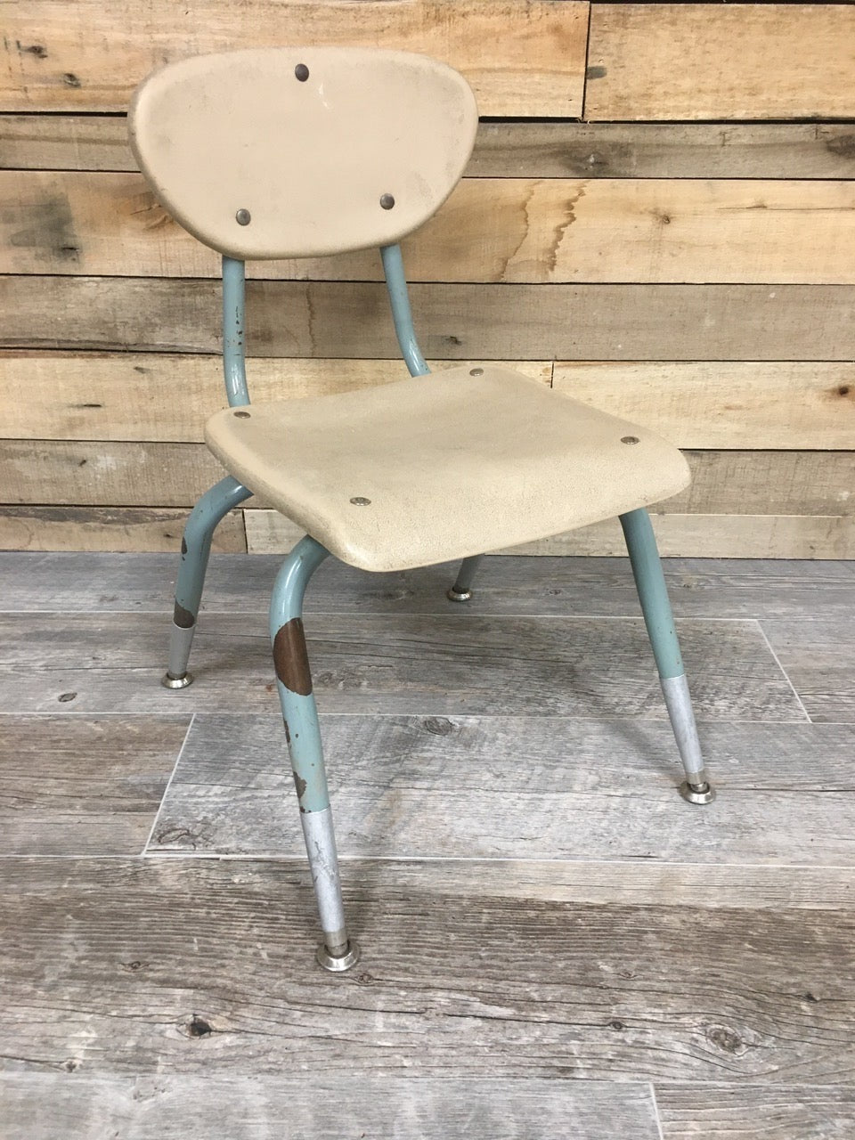 Tan child’s chair