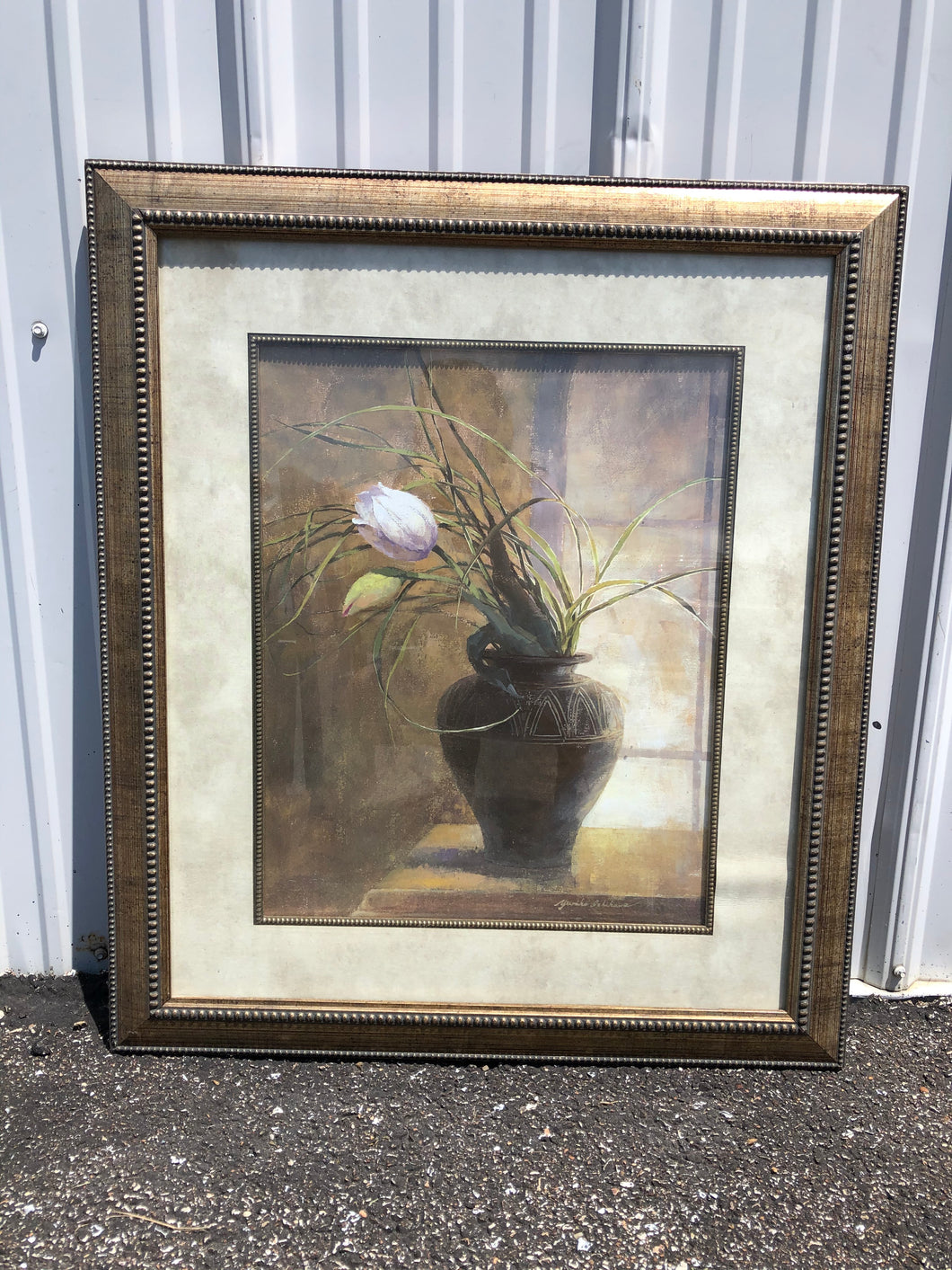 Single Purple Flower in Brown Vase